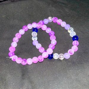 Bundle of purple bracelets